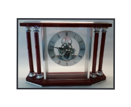 A clock with pillars and a glass case.